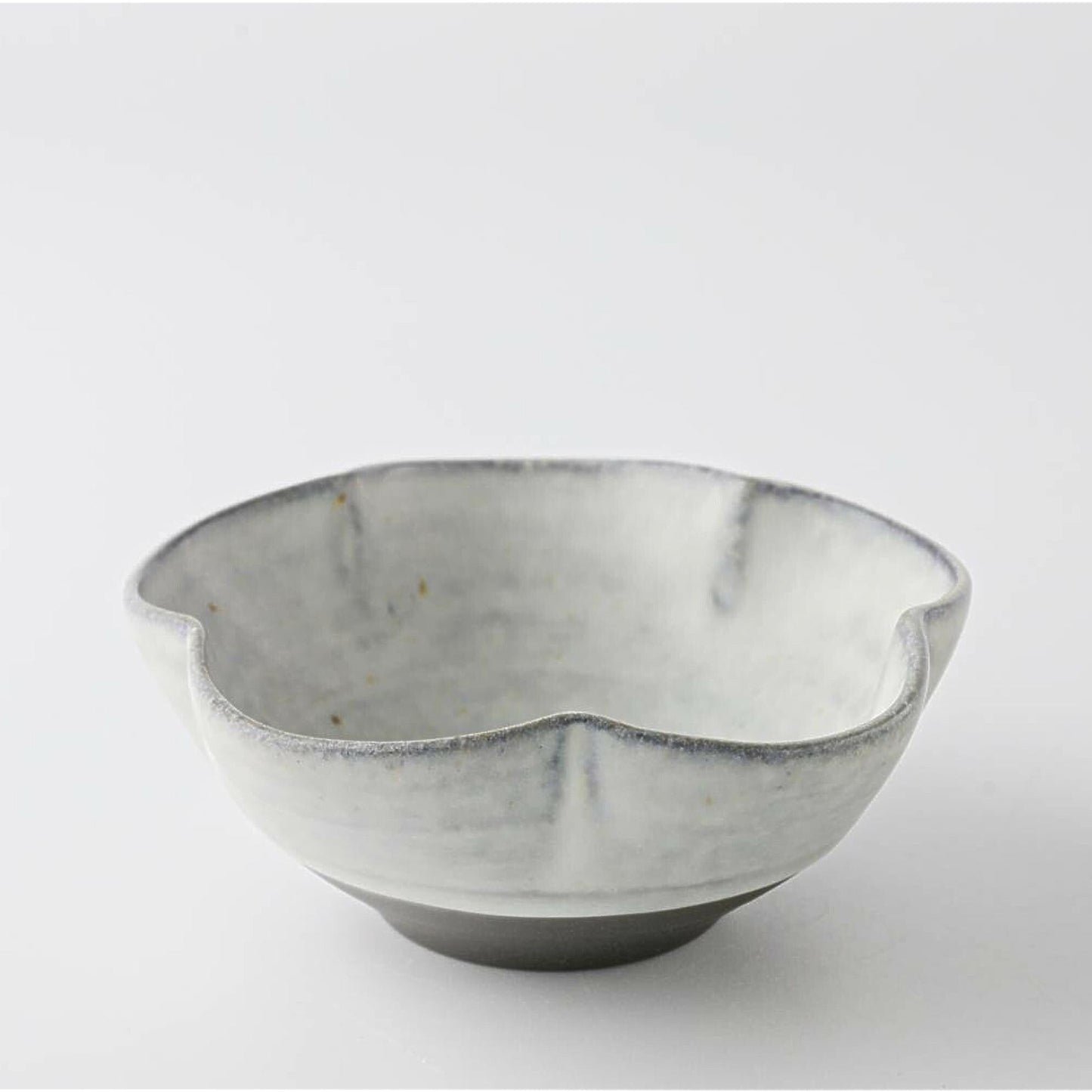 Gray ceramic bowl on a white background