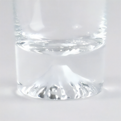 Clear glass tumbler on a white background