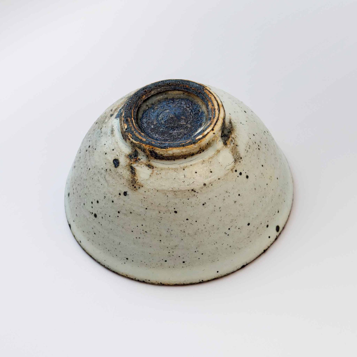 Handmade V-Shape Bowl with kohiki glaze, set against a neutral background.