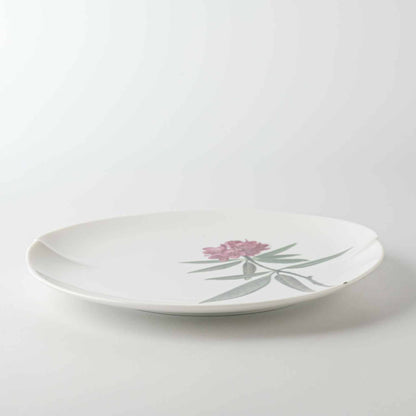 A white, 8-inch porcelain plate with a delicate Yezo hydrangea design.